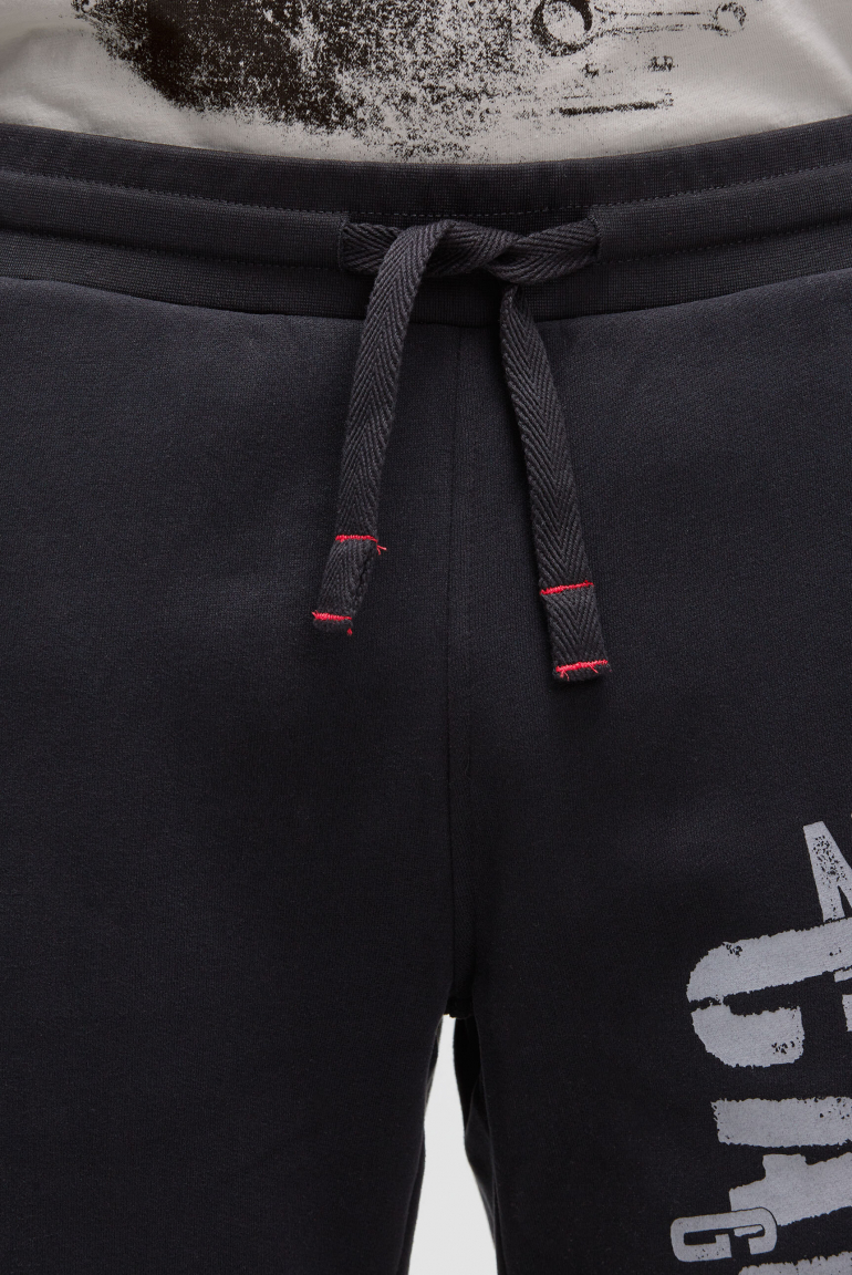 Jogginghose mit Seitentapes und Logo Prints