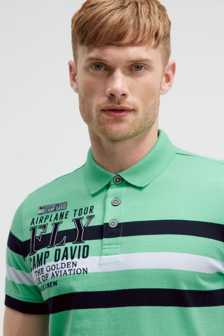 Kurzarmpolo mit Streifen-Design und Artworks