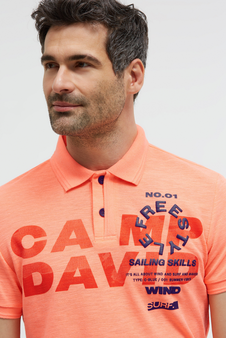 Pikee-Polo mit Artworks und Puffprint-Details