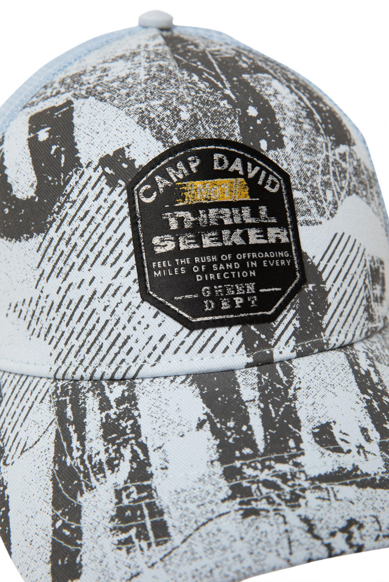 Trucker Cap mit All Over Print und Patch