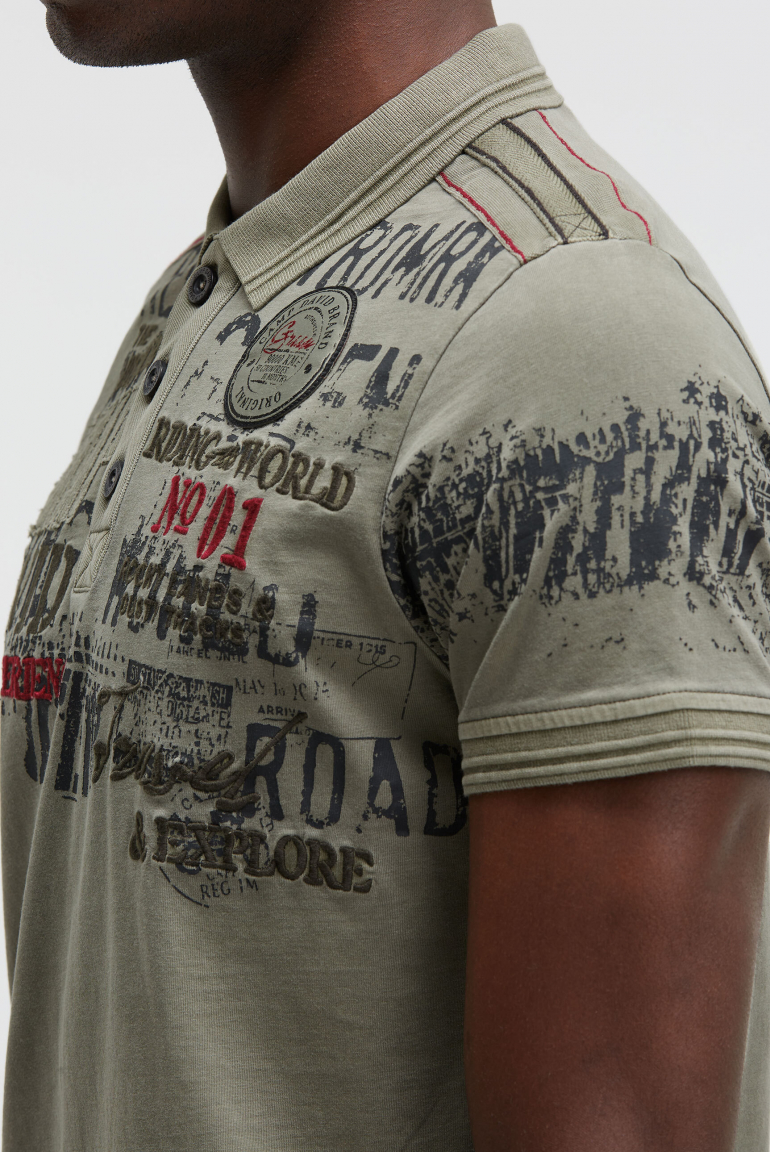 Kurzarmpolo mit Tapes und Logo-Applikationen