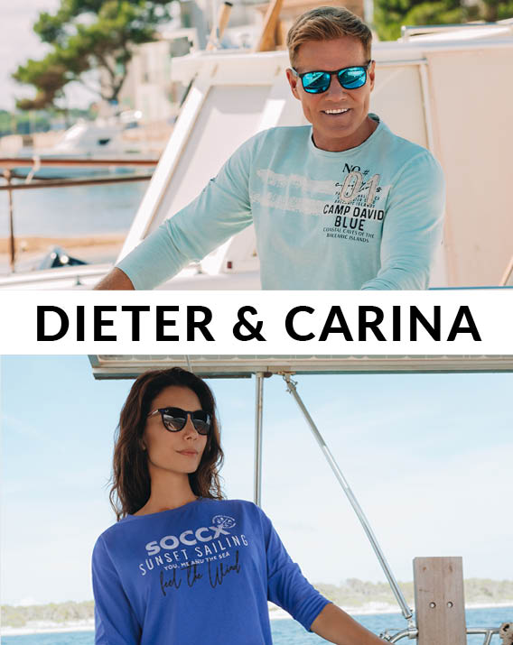 Dieter und Carina auf einem Boot in farbiger Sommerkleidung